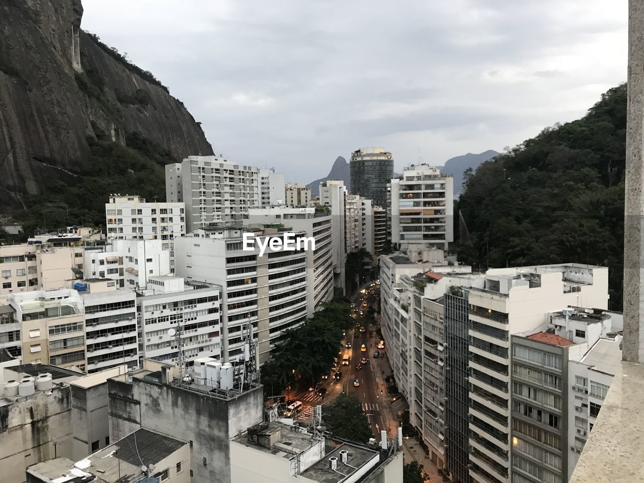 High angle view of buildings in city against sky