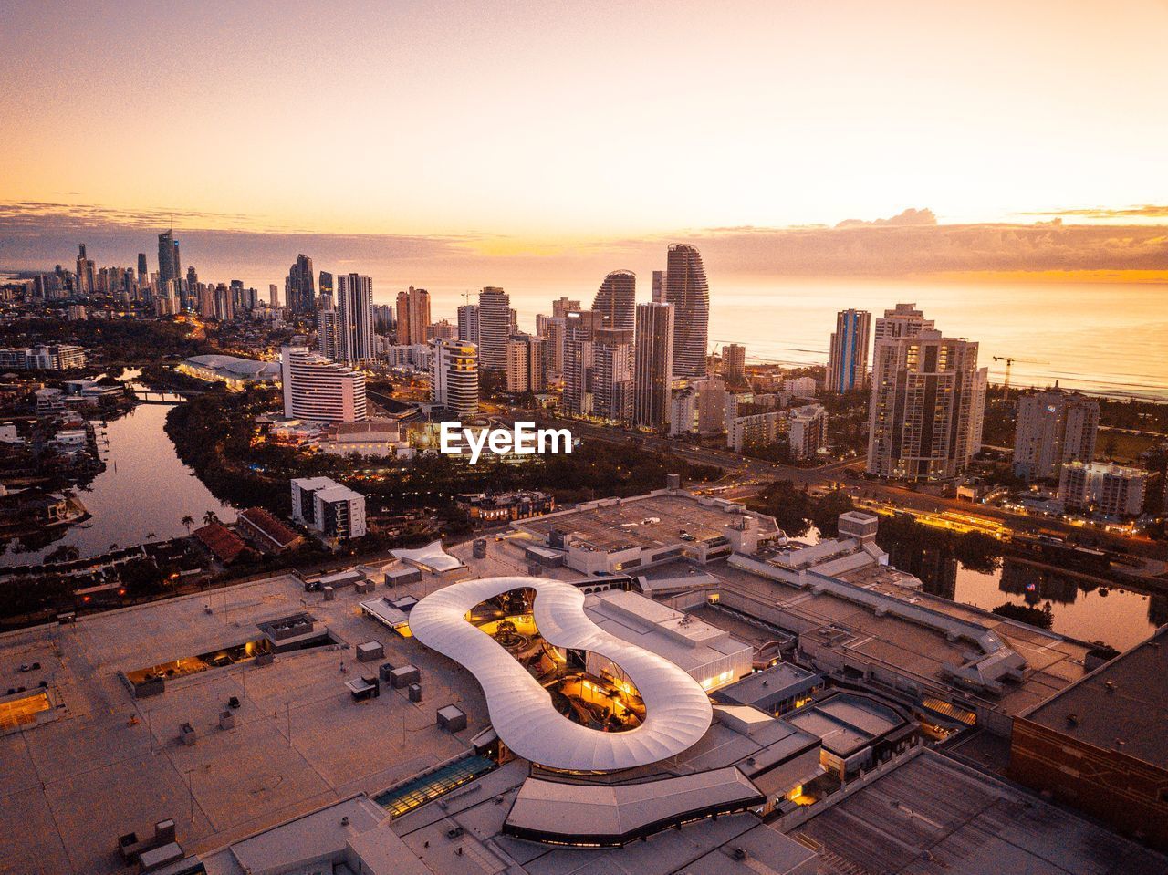 High angle view of city buildings during sunset