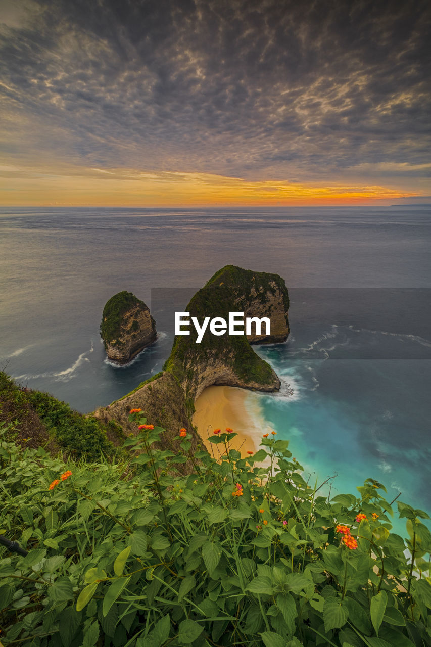 Scenic view of sea against sky during sunset