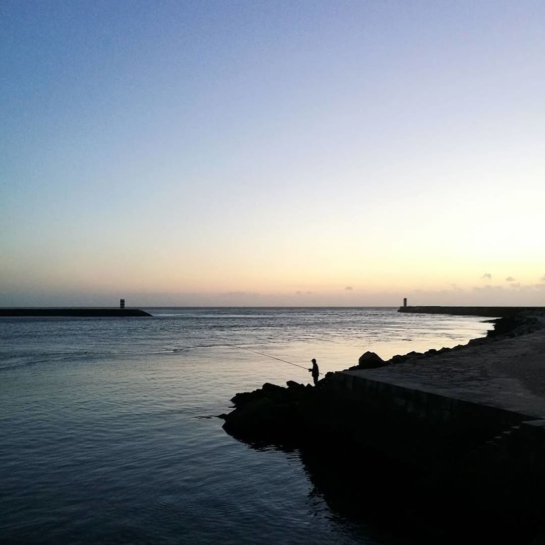 VIEW OF SEA AT SUNSET