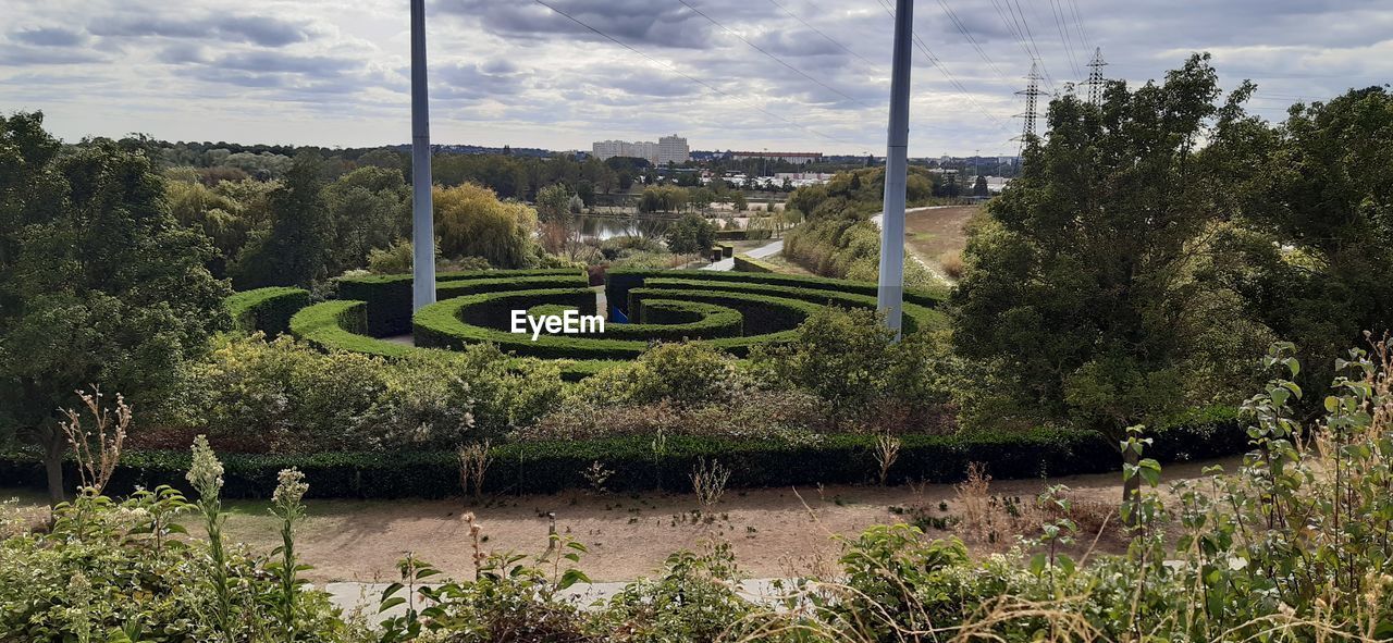 plant, tree, nature, garden, cloud, sky, no people, grass, day, growth, green, outdoors, rural area, architecture, landscape, park, water, sport venue, tranquility, built structure