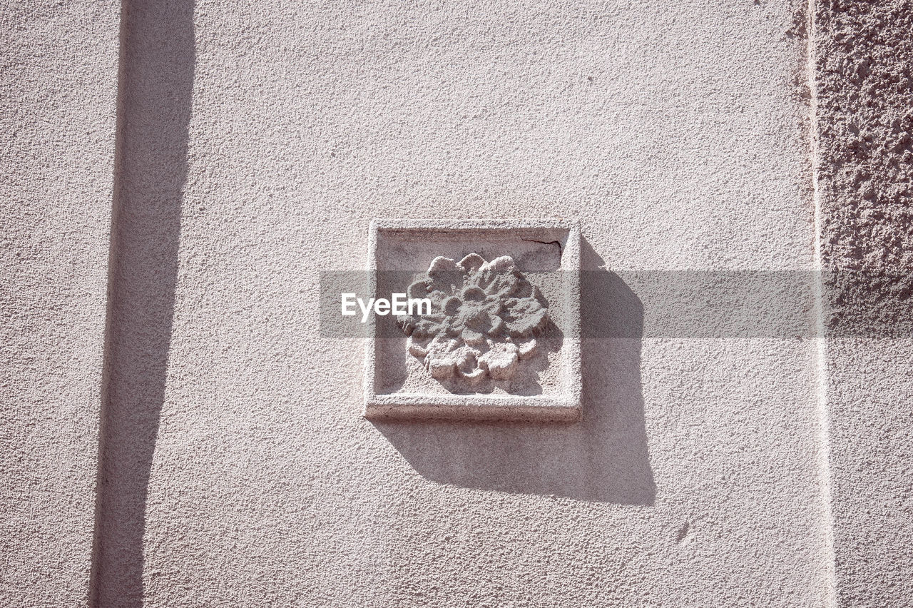 wall - building feature, built structure, no people, white, day, architecture, sunlight, close-up, wall, building exterior, textured, pattern, outdoors, shadow, shape, creativity