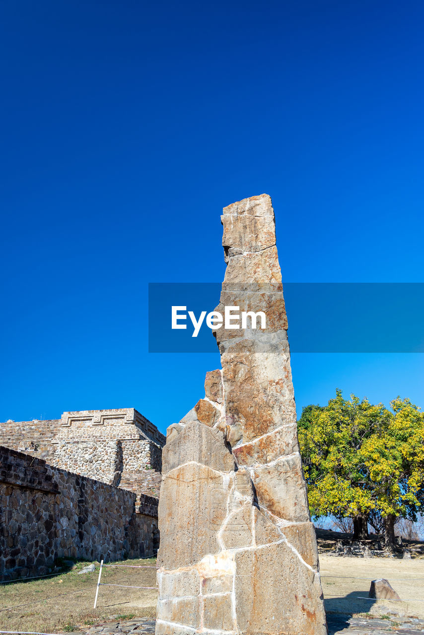 RUINS OF BUILDING AGAINST CLEAR BLUE SKY