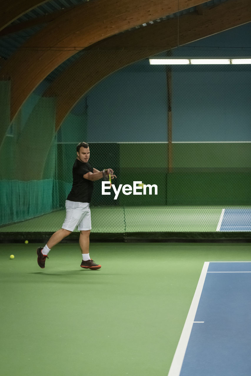 Man playing tennis