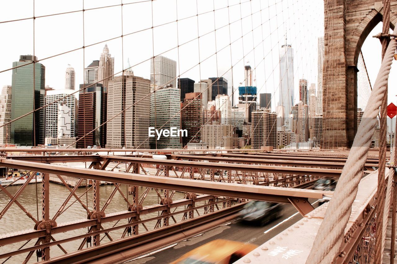 Brooklyn bridge against cityscape