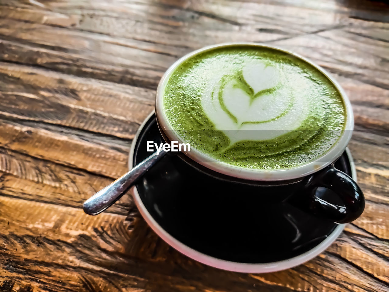 High angle view of coffee cup on table