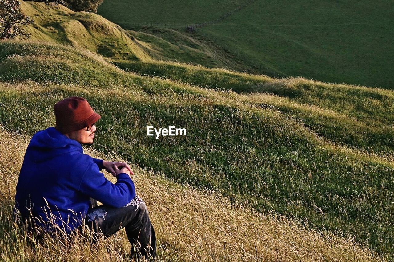 Man sitting on mountain