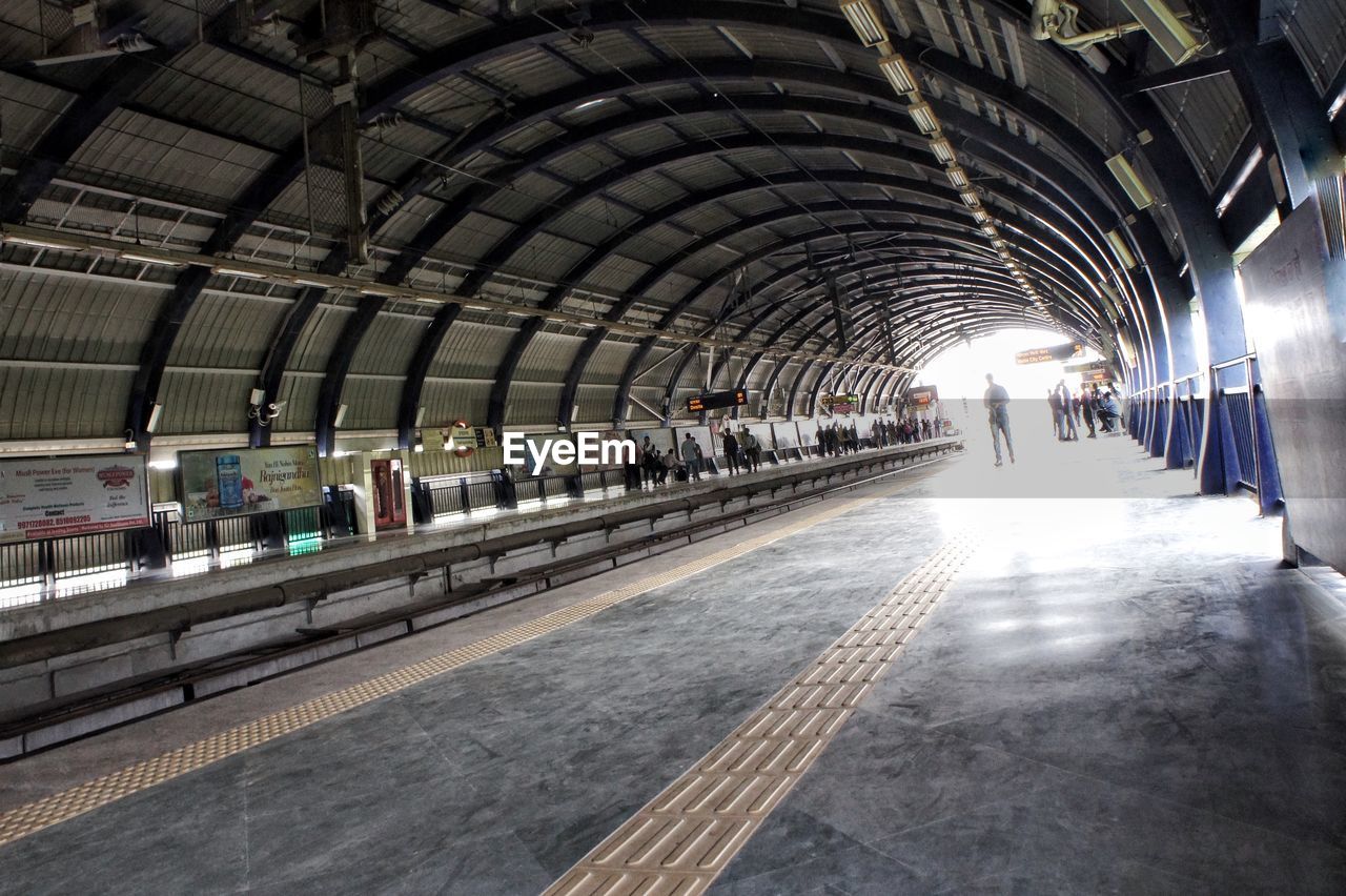 View of commuters on railroad platform