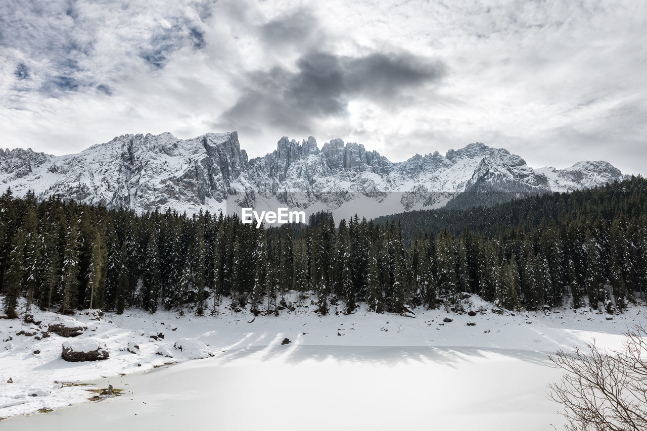 Scenic view of mountains against sky during winter