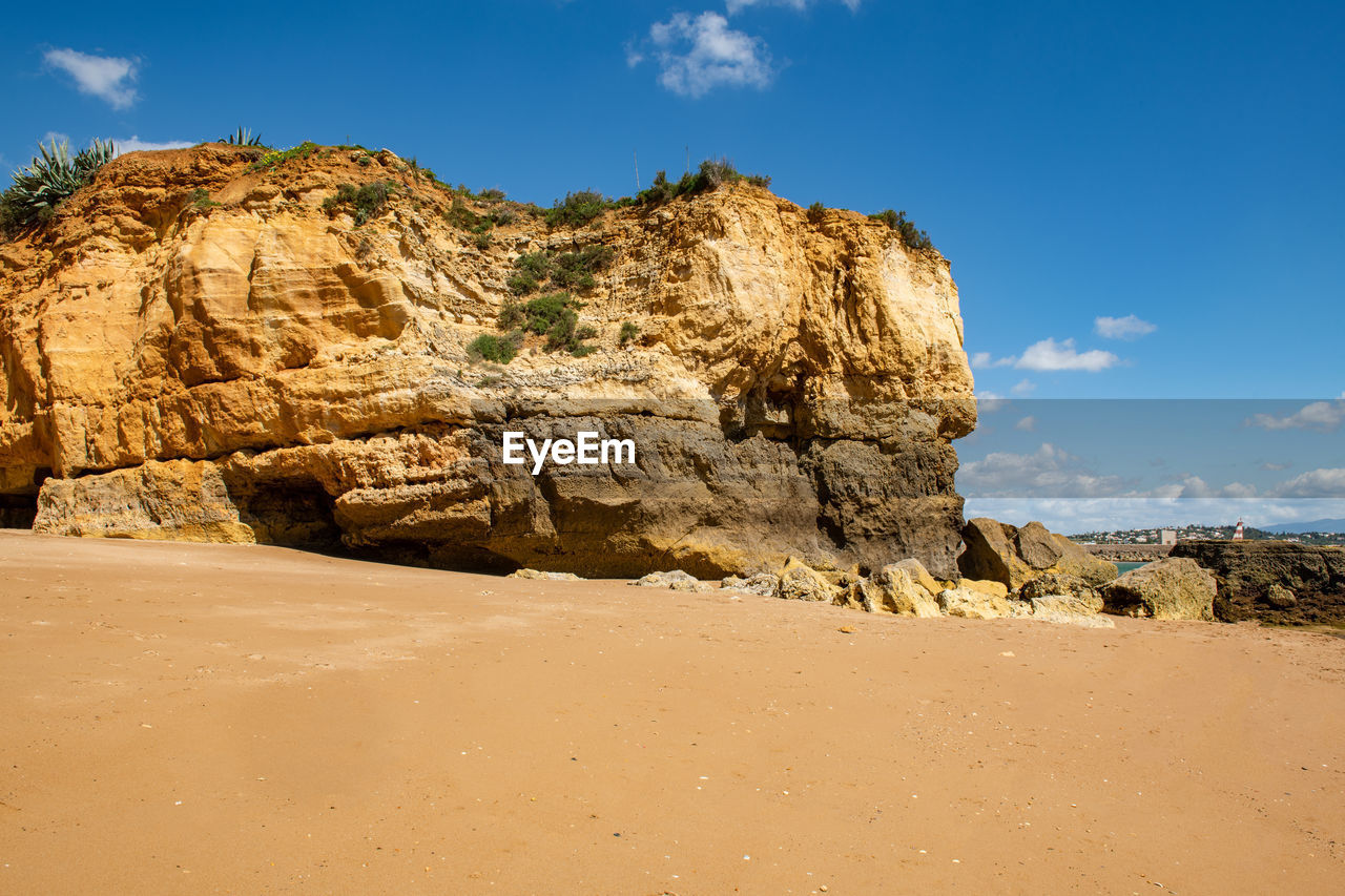 ROCK FORMATIONS AGAINST SKY