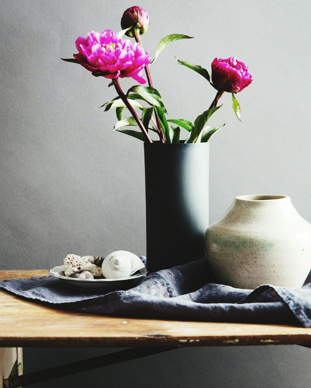 Close-up of flower vase on table at home