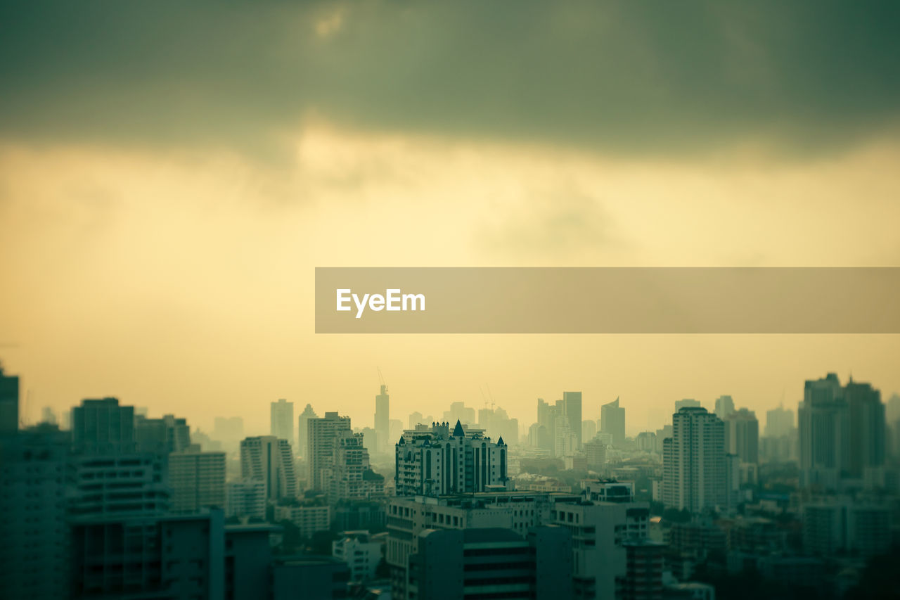 CITYSCAPE AGAINST SKY DURING SUNSET