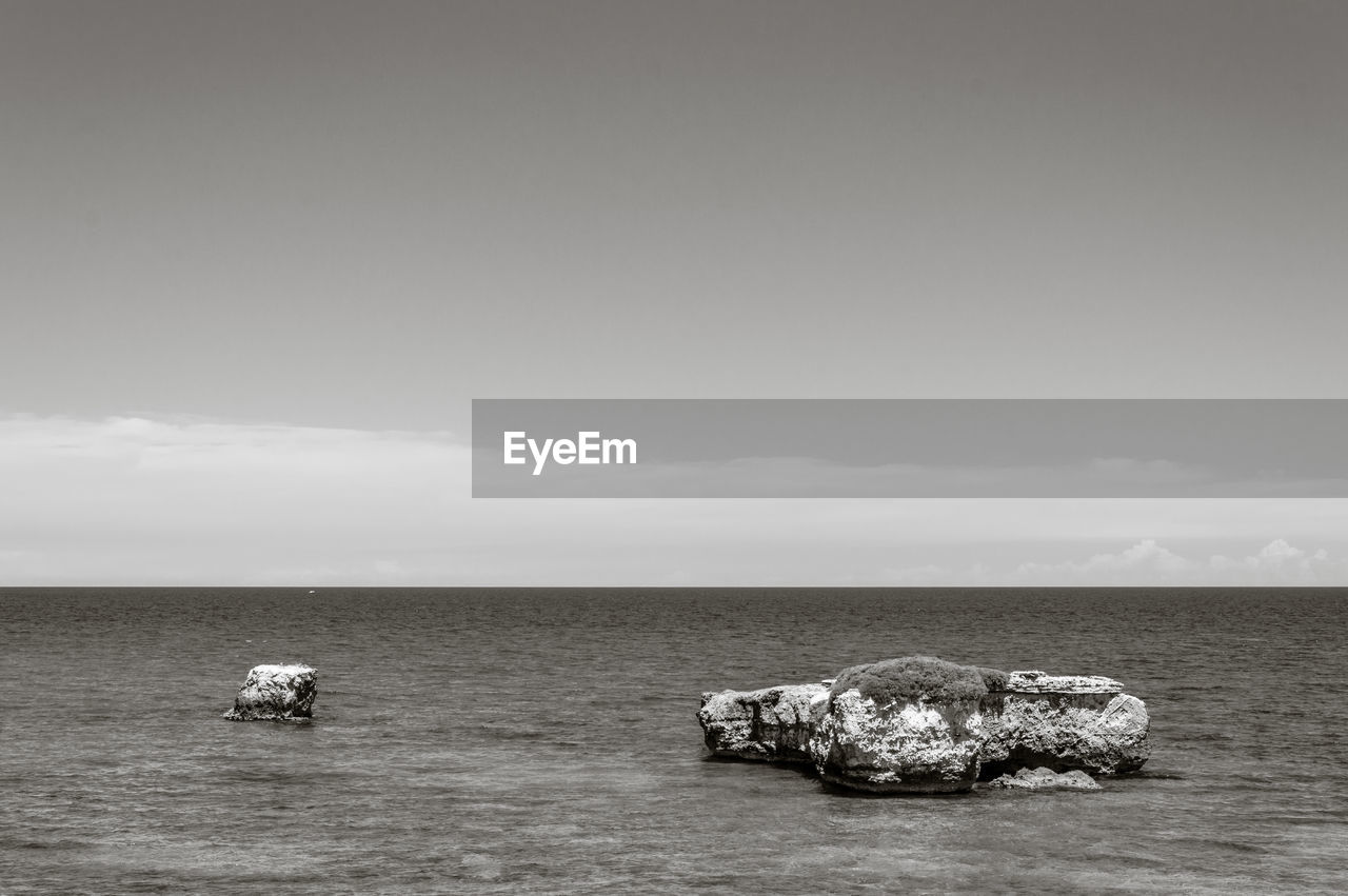 NAUTICAL VESSEL ON SEA AGAINST SKY