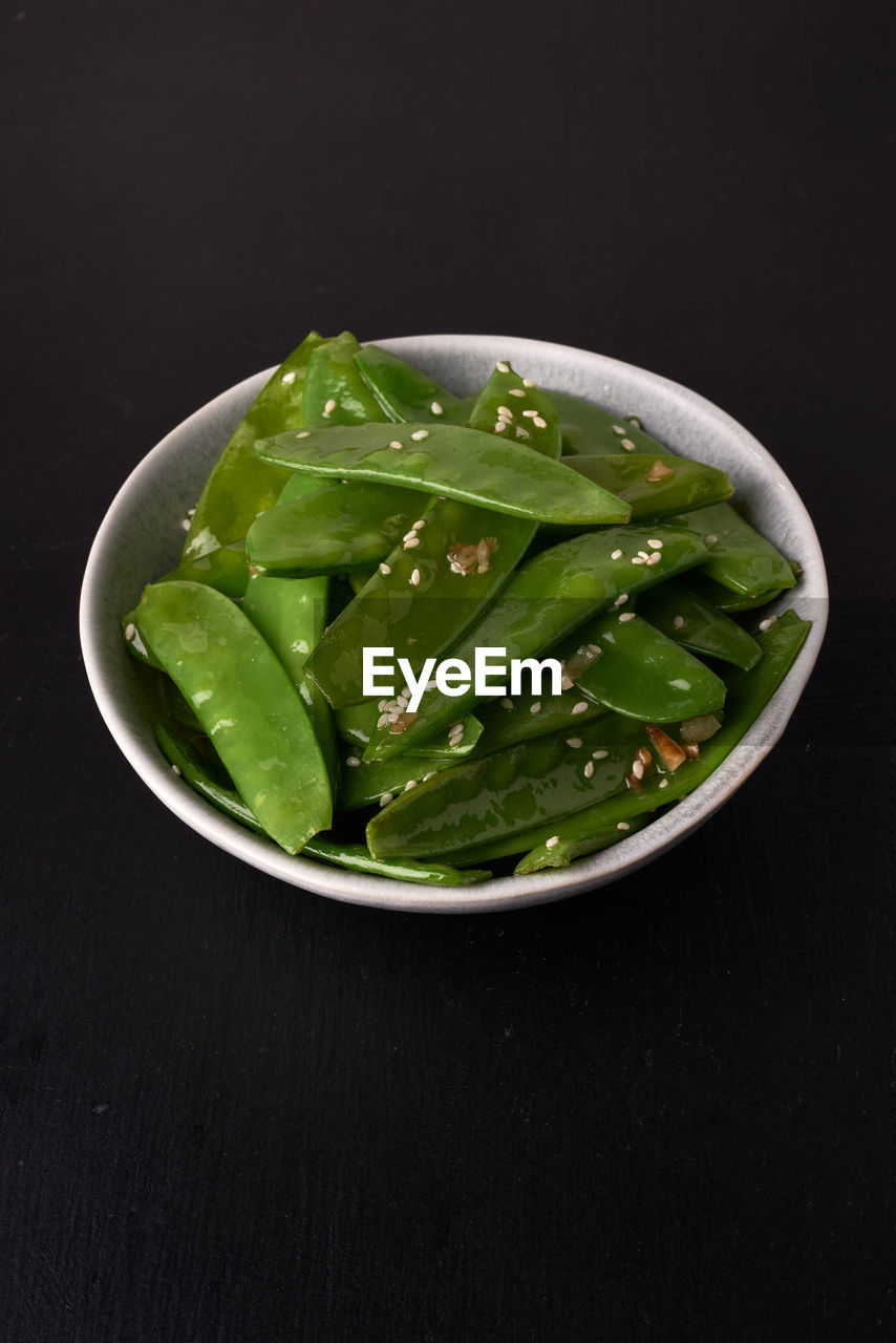Fried snow peas in asian style