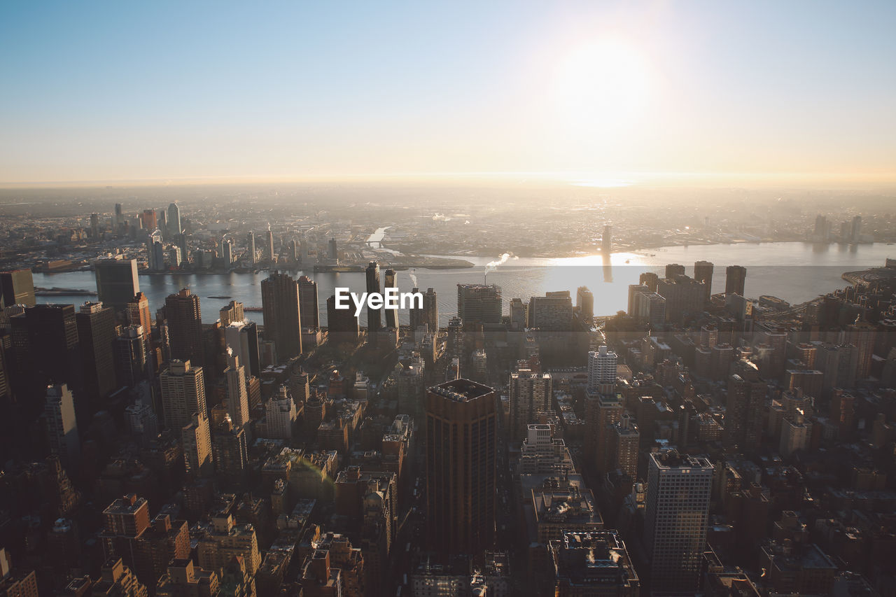 Aerial view of city at sunset