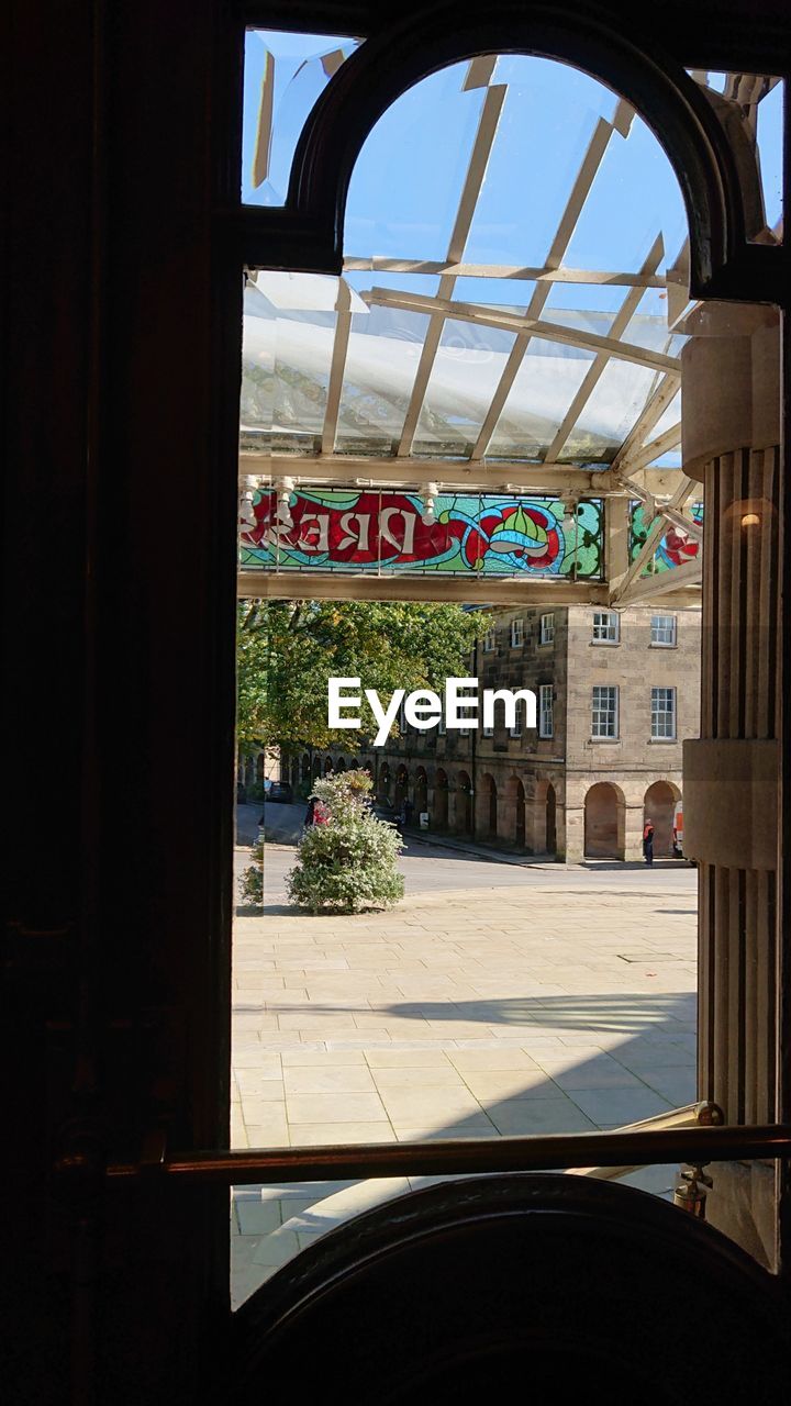 ENTRANCE OF BUILDING AGAINST SKY