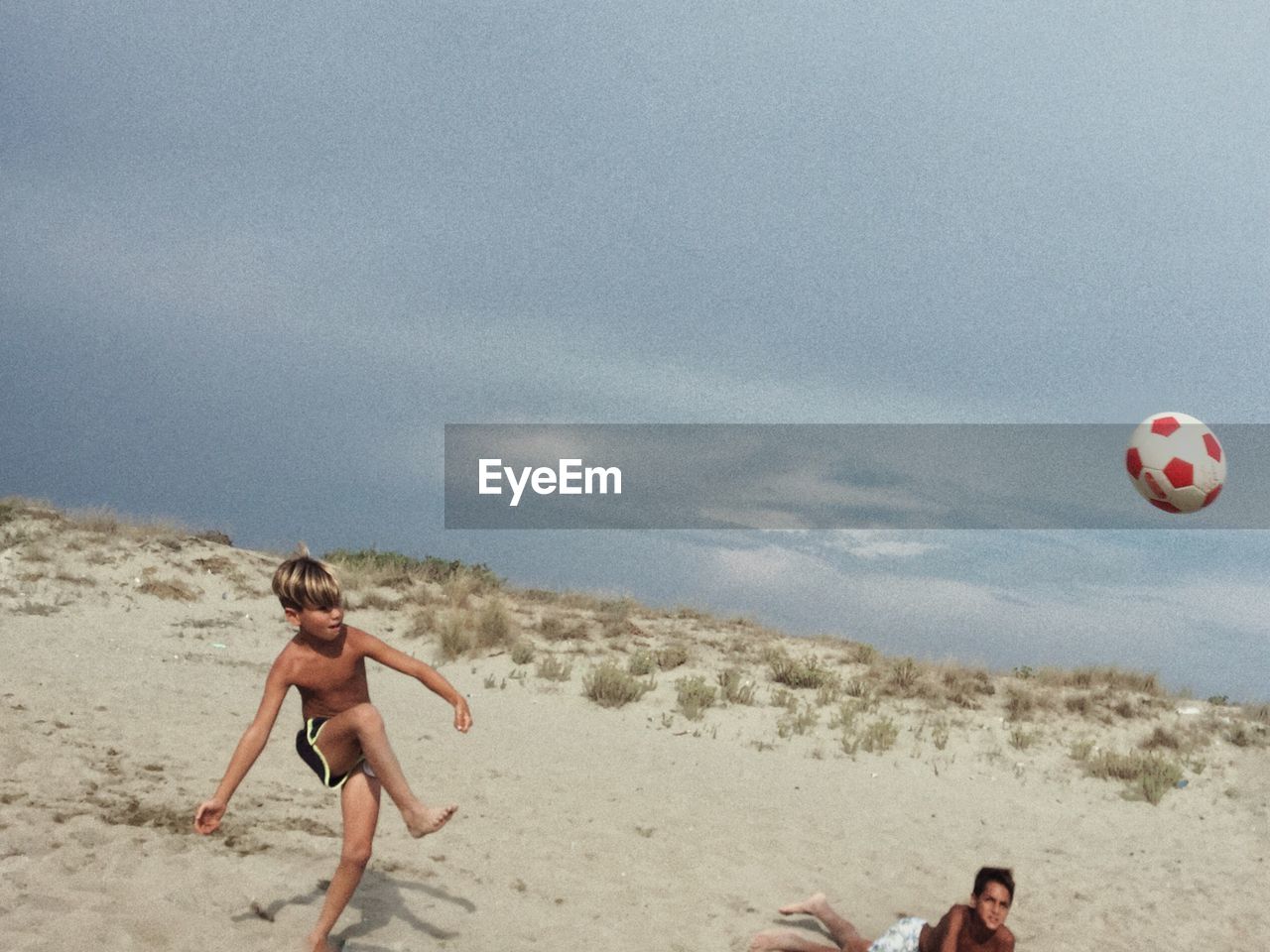 WOMAN ENJOYING ON BEACH