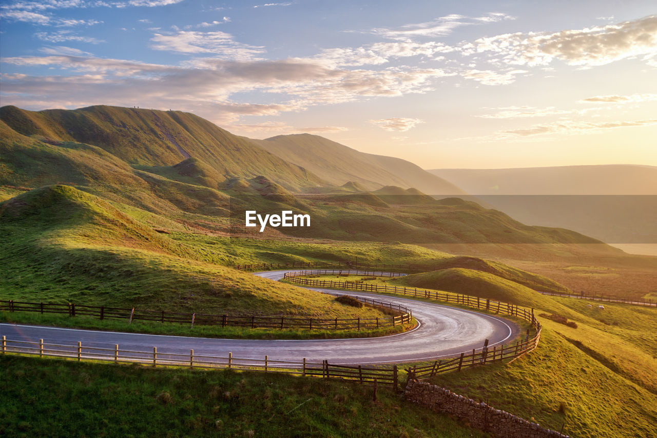 Scenic view of mountains against sky during sunset