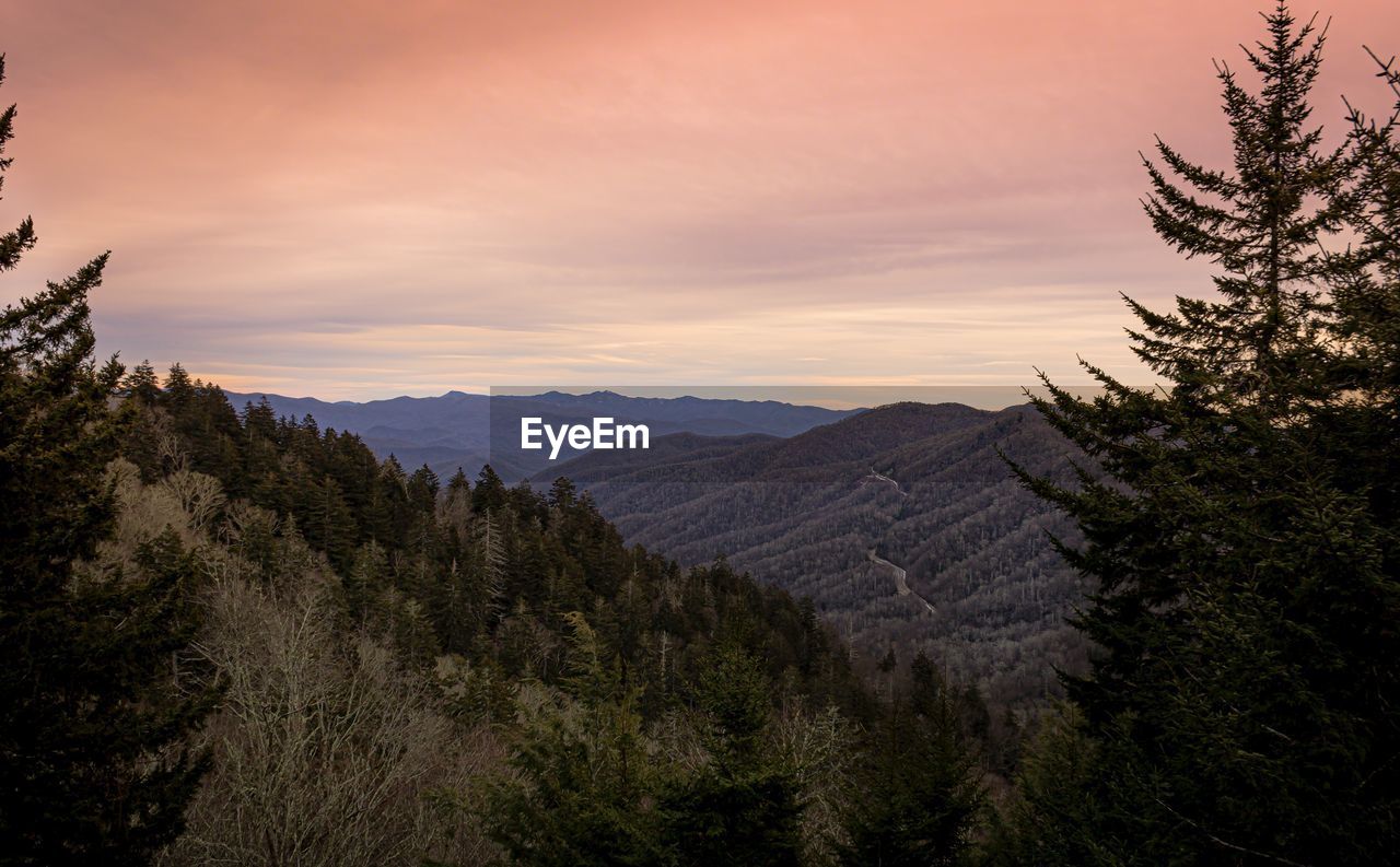 Scenic view of mountains against sky during sunset