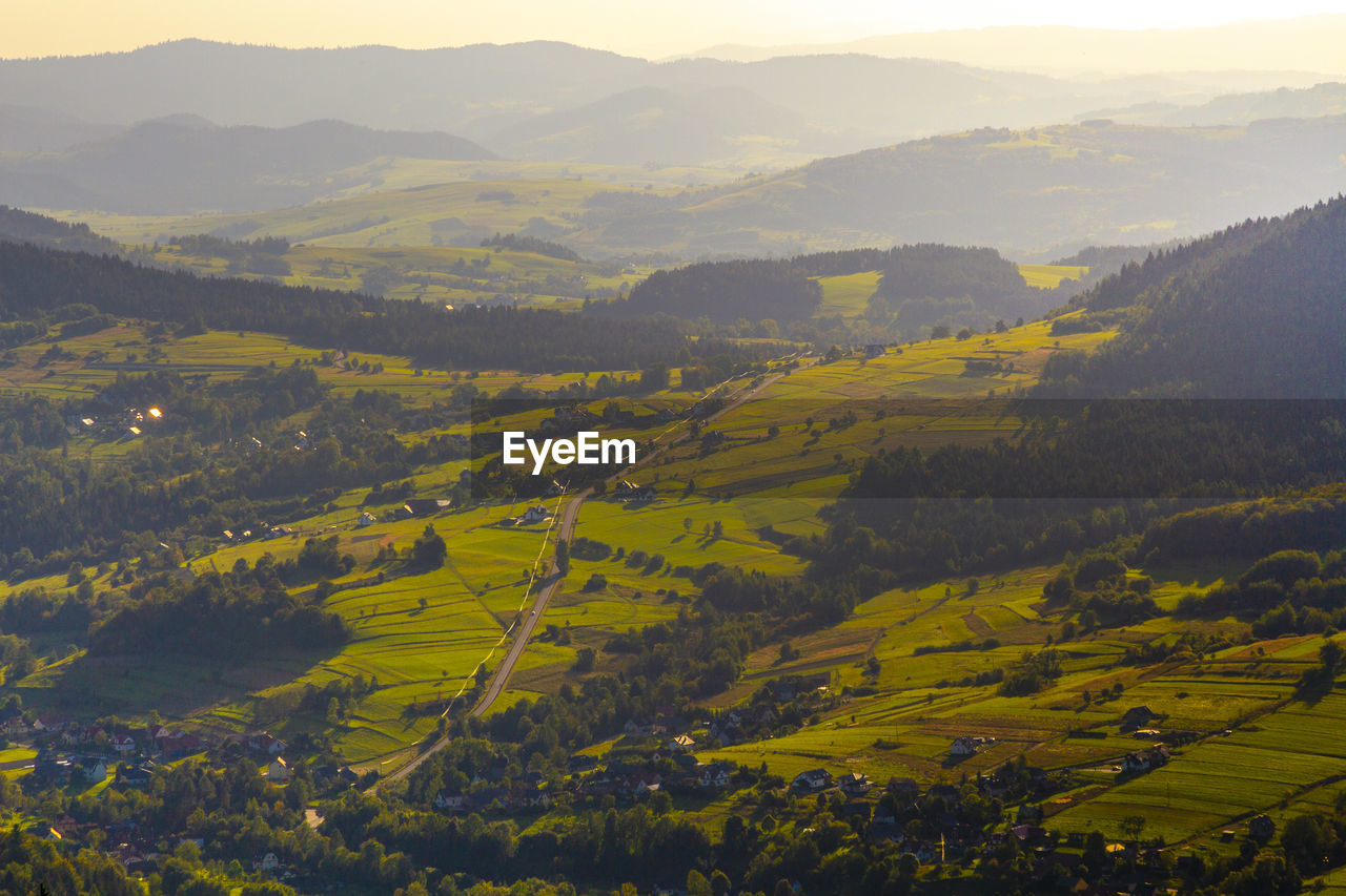 Scenic view of agricultural field and mountains