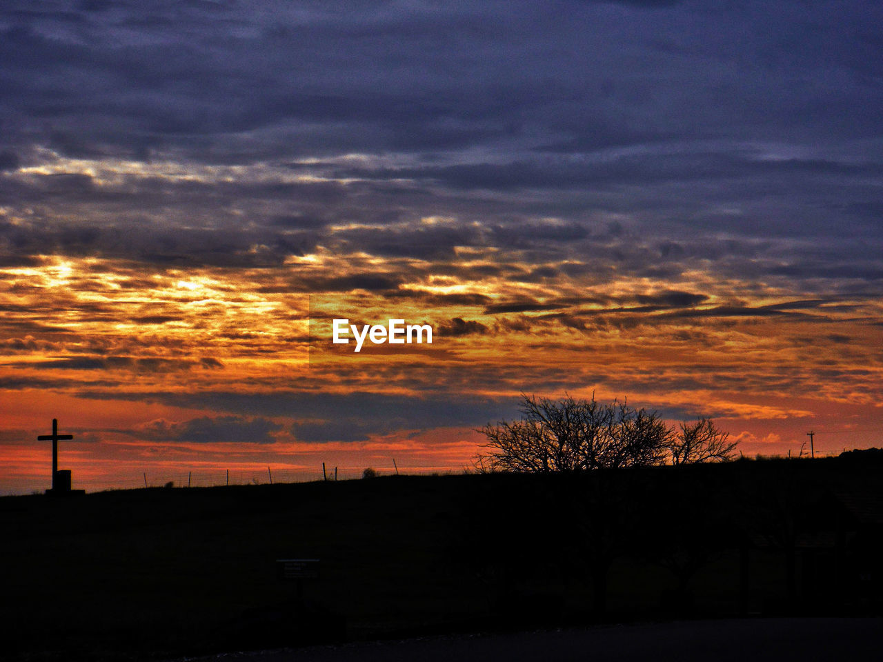 Scenic view of silhouette landscape against sky during sunset