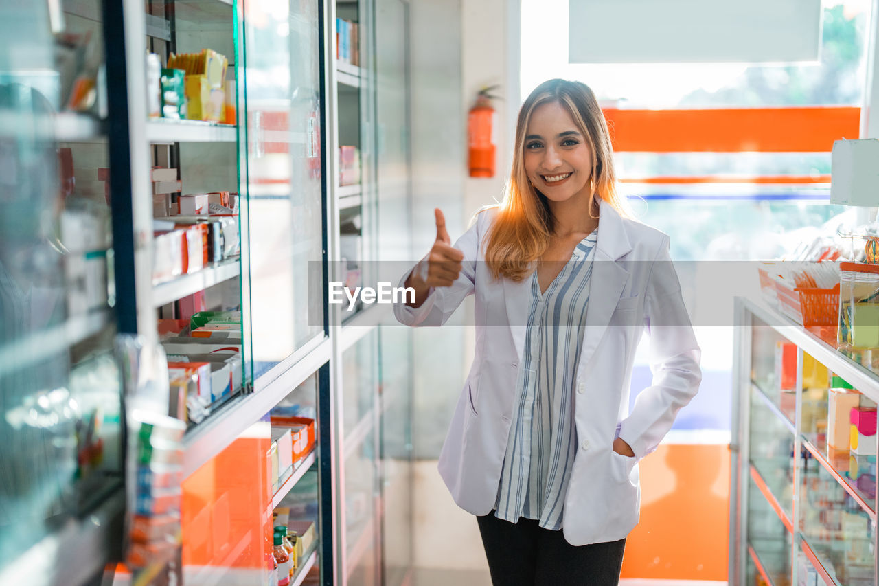 portrait of woman standing in store