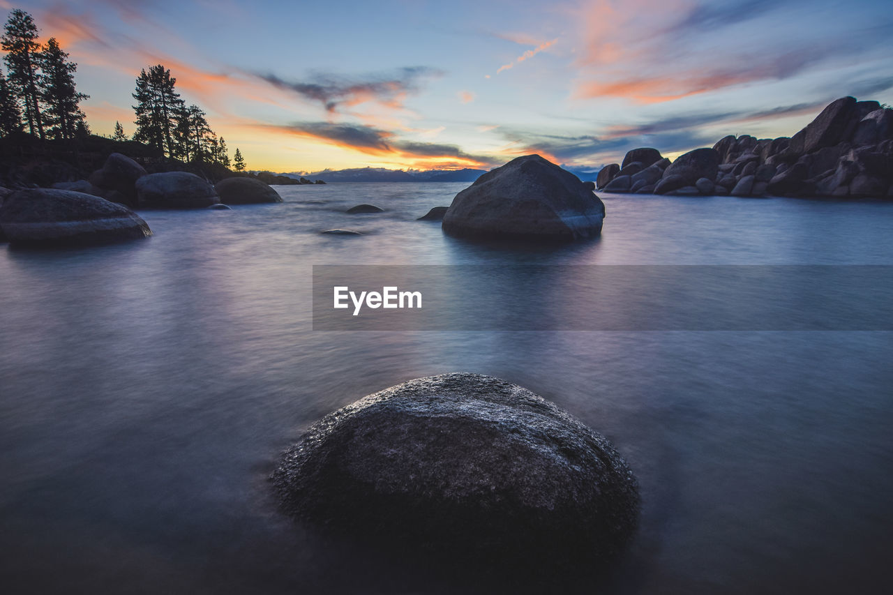 Scenic view of sea against sky during sunset