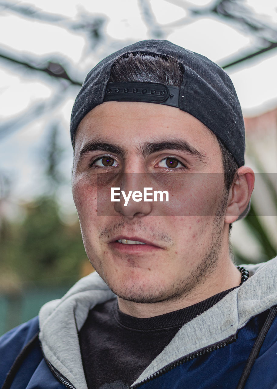 Close-up portrait of young man outdoors