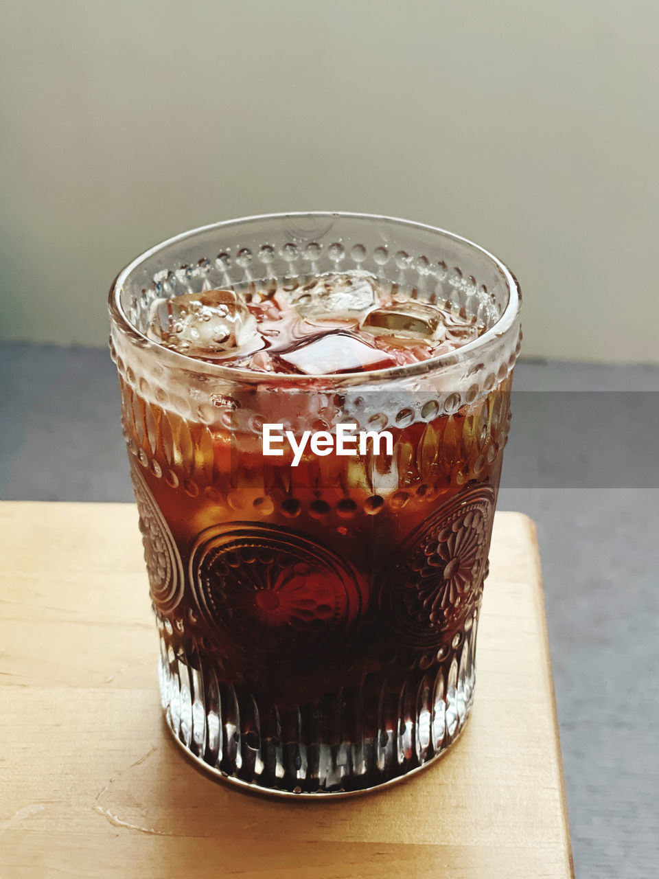 CLOSE-UP OF DRINK IN GLASS