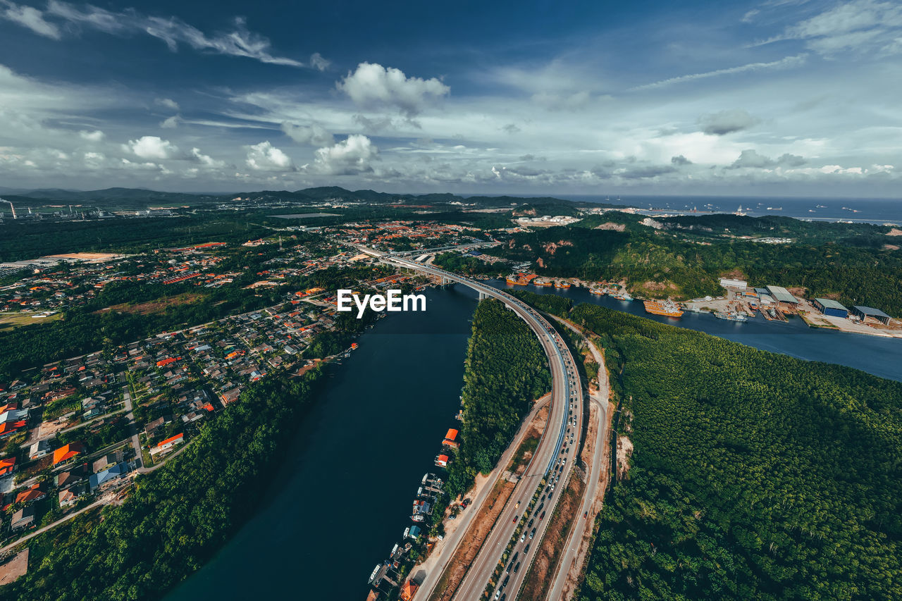 High angle view of city and buildings against sky