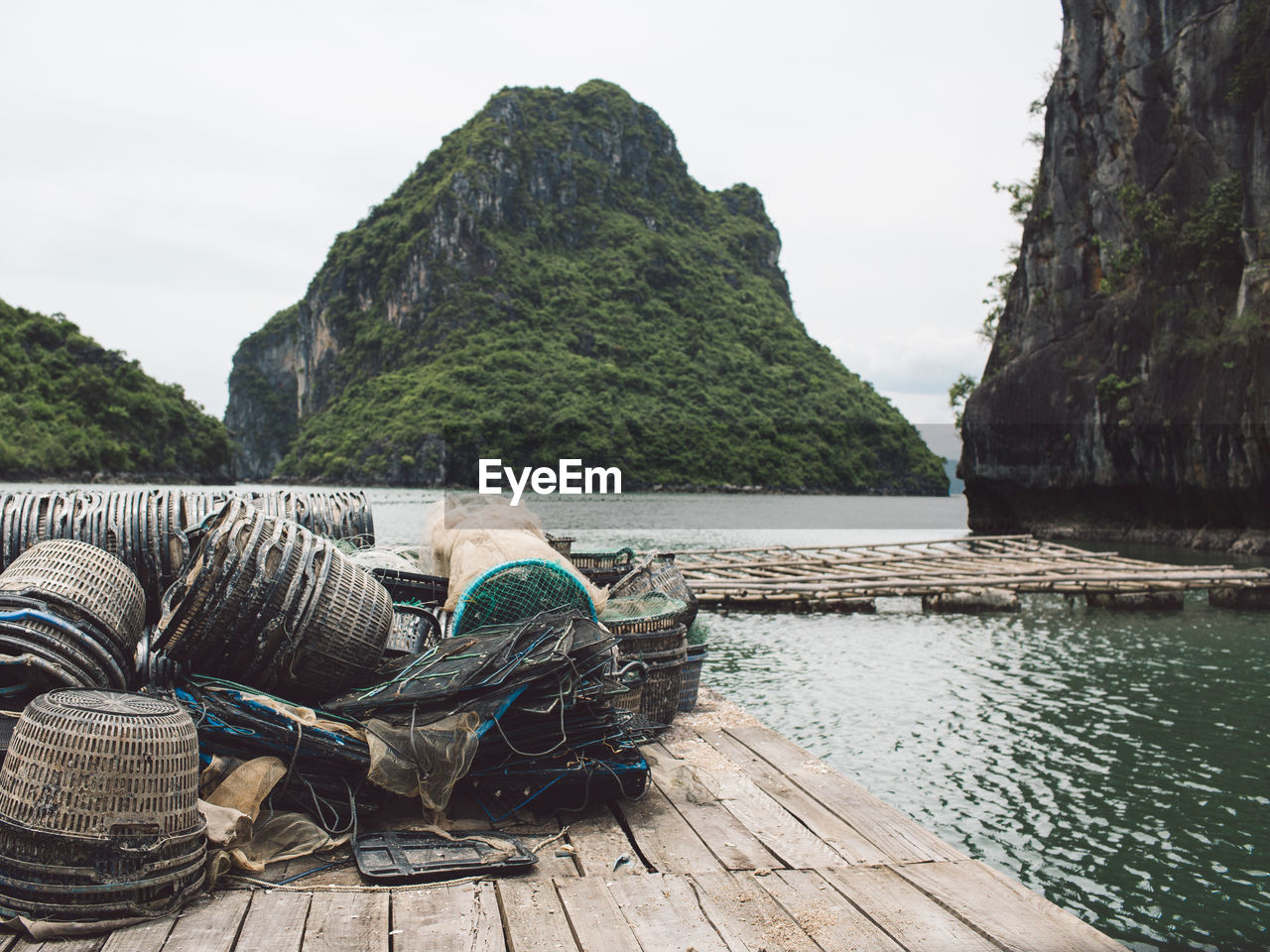 Fishing baskets on pier at halong bay