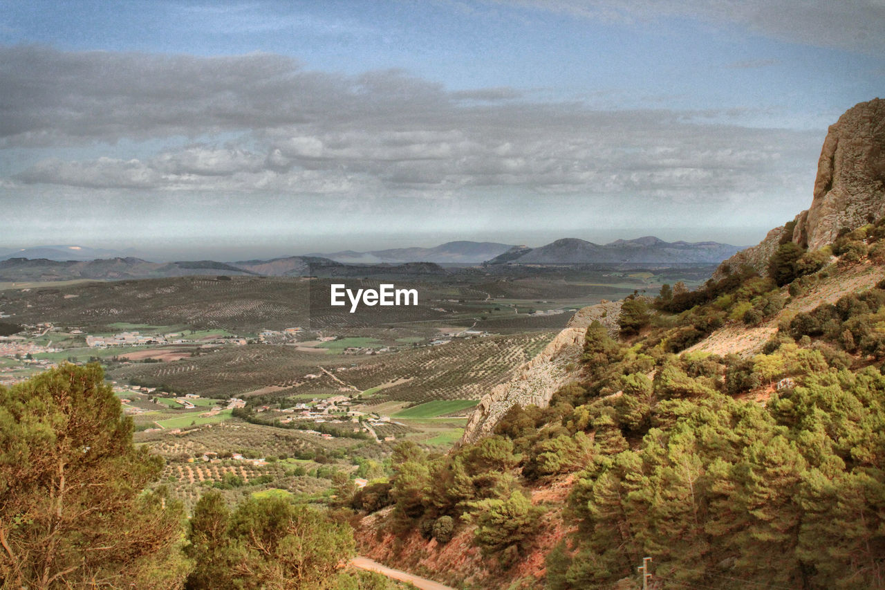 environment, landscape, scenics - nature, land, mountain, nature, sky, beauty in nature, cloud, plant, travel destinations, travel, tranquility, tree, no people, outdoors, valley, tourism, architecture, tranquil scene, mountain range, rock, non-urban scene, rural scene, cliff, terrain, water, wilderness, high angle view, sea, fog, day, plateau, building, coast