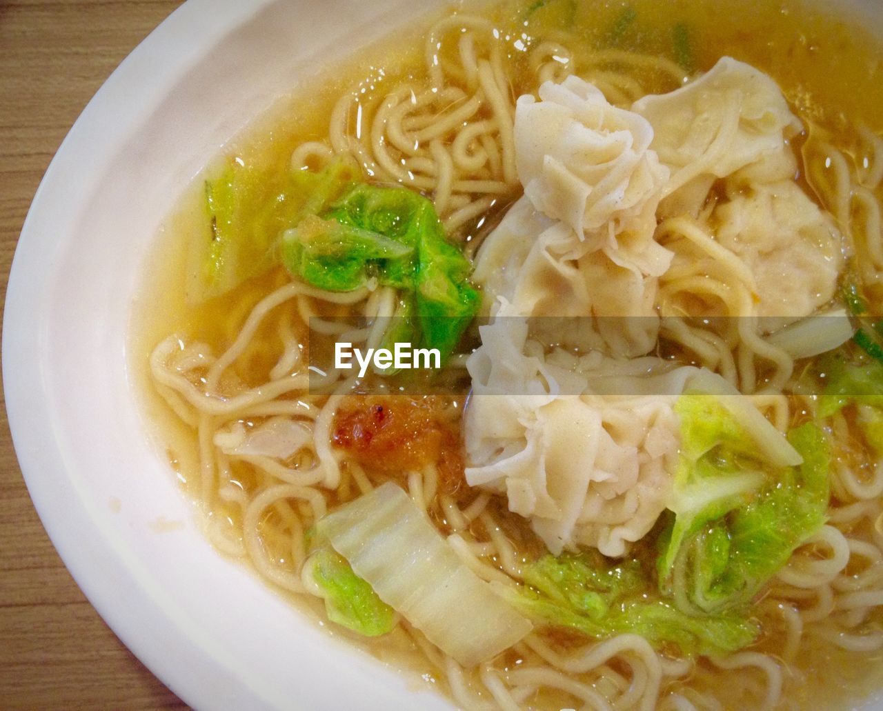 CLOSE-UP OF SOUP SERVED WITH NOODLES