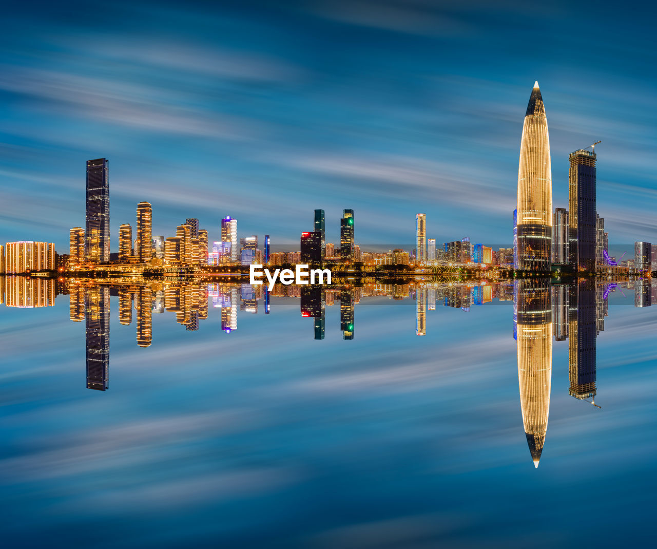 REFLECTION OF BUILDING IN WATER