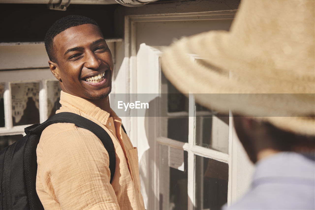 Smiling man looking away