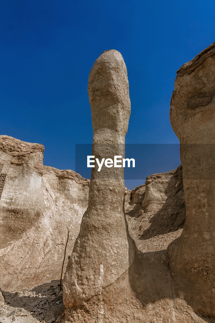 Sandstone formations around al khobar caves, jebel qarah