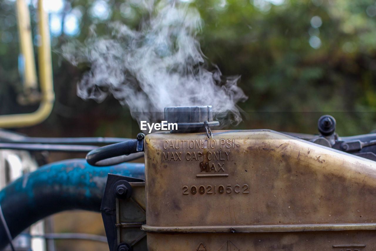 Cropped image of gas tank of vehicle