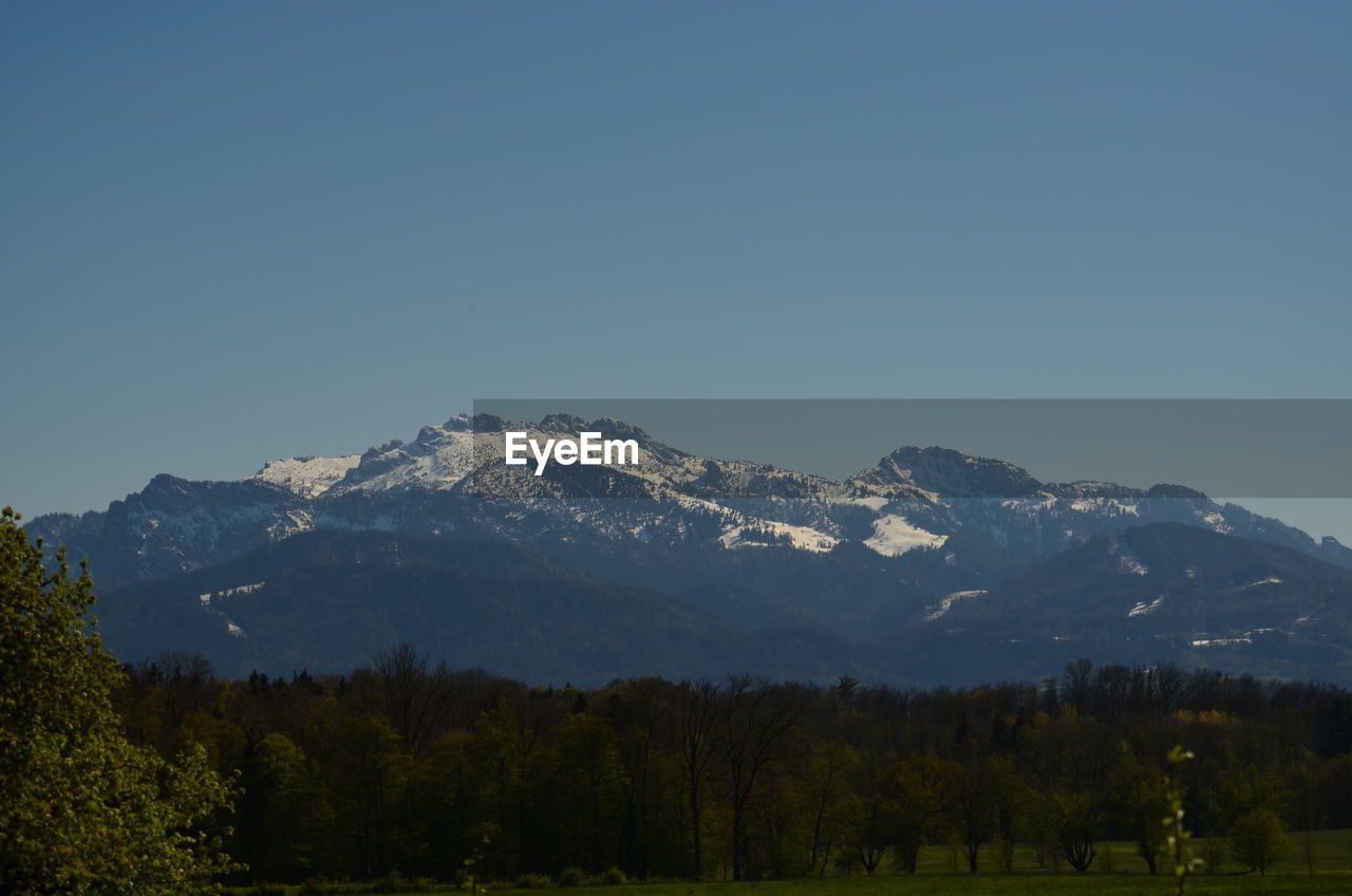 Scenic view of mountains against clear sky