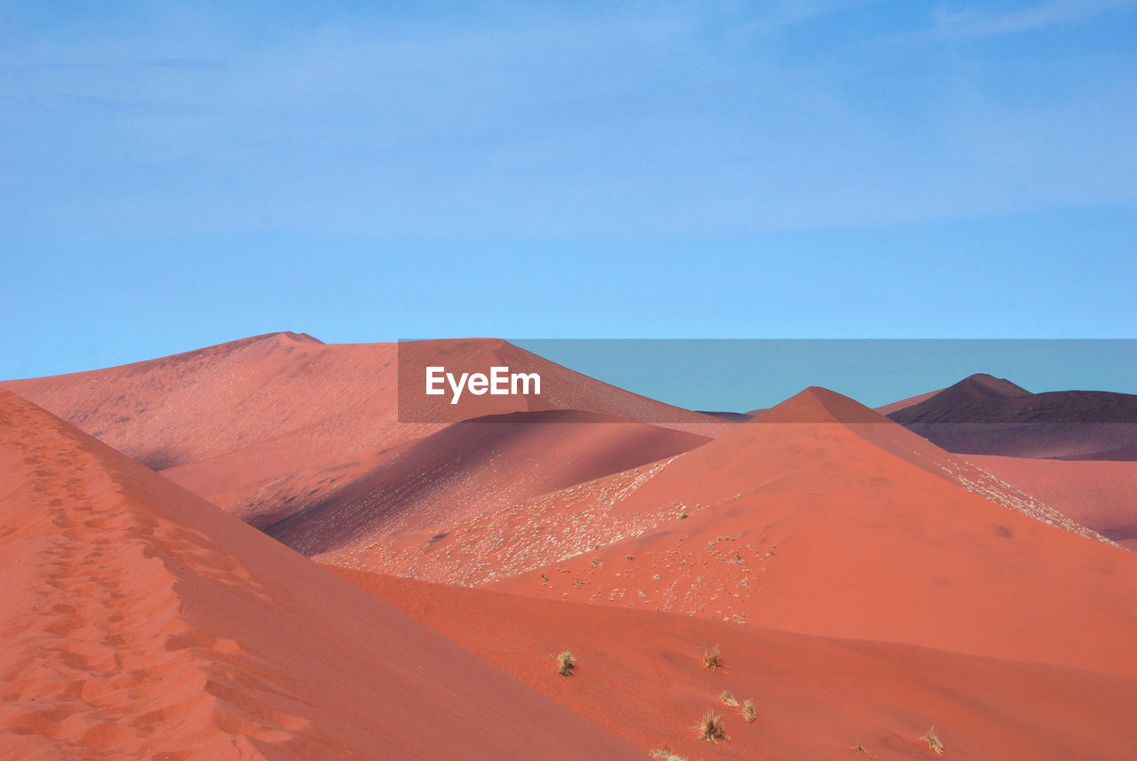 VIEW OF SAND DUNES IN DESERT