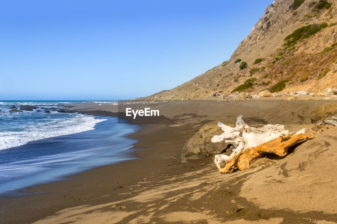 Scenic view of beach against clear sky, california 