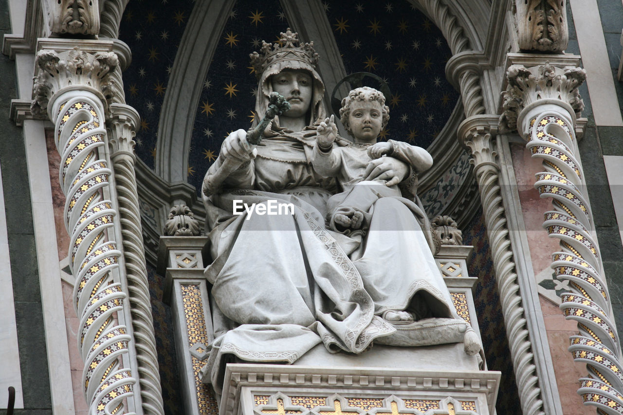 Low angle view of statue against building in florence italy 