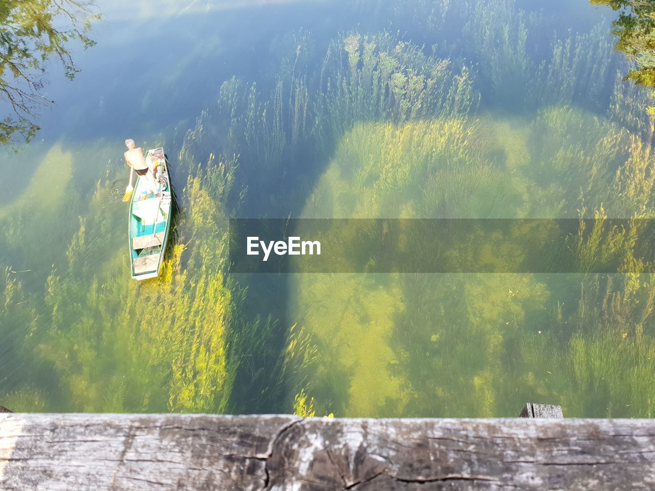 PANORAMIC VIEW OF PEOPLE ON LAND AGAINST MOUNTAINS