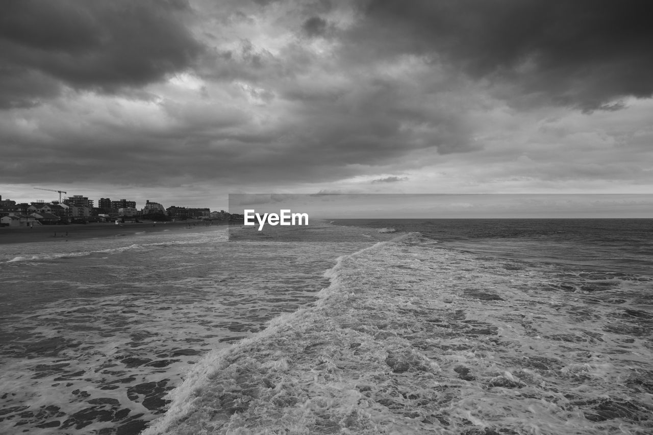 Scenic view of beach against sky