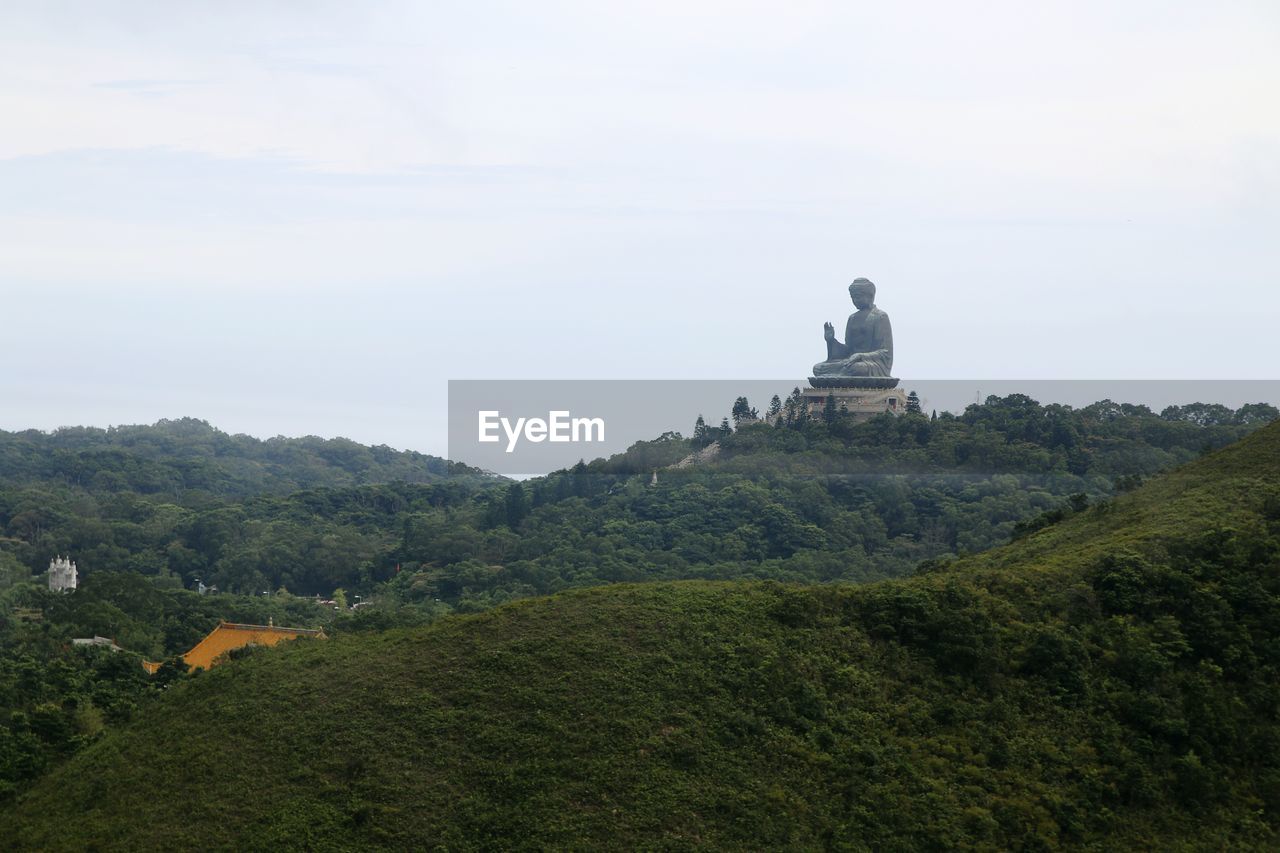 VIEW OF STATUE ON MOUNTAIN