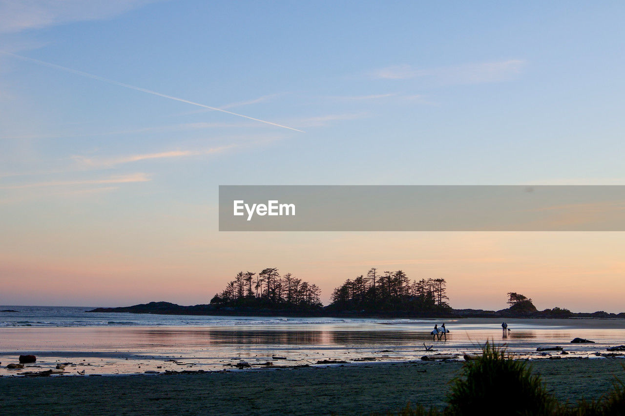sky, water, sea, beauty in nature, land, scenics - nature, sunset, horizon, nature, beach, body of water, shore, tranquility, dusk, cloud, ocean, tranquil scene, coast, evening, travel destinations, travel, plant, reflection, bay, no people, idyllic, tree, environment, outdoors, architecture, tourism, holiday, wave, horizon over water, landscape, trip, vacation, non-urban scene, coastline, blue, sun, seascape