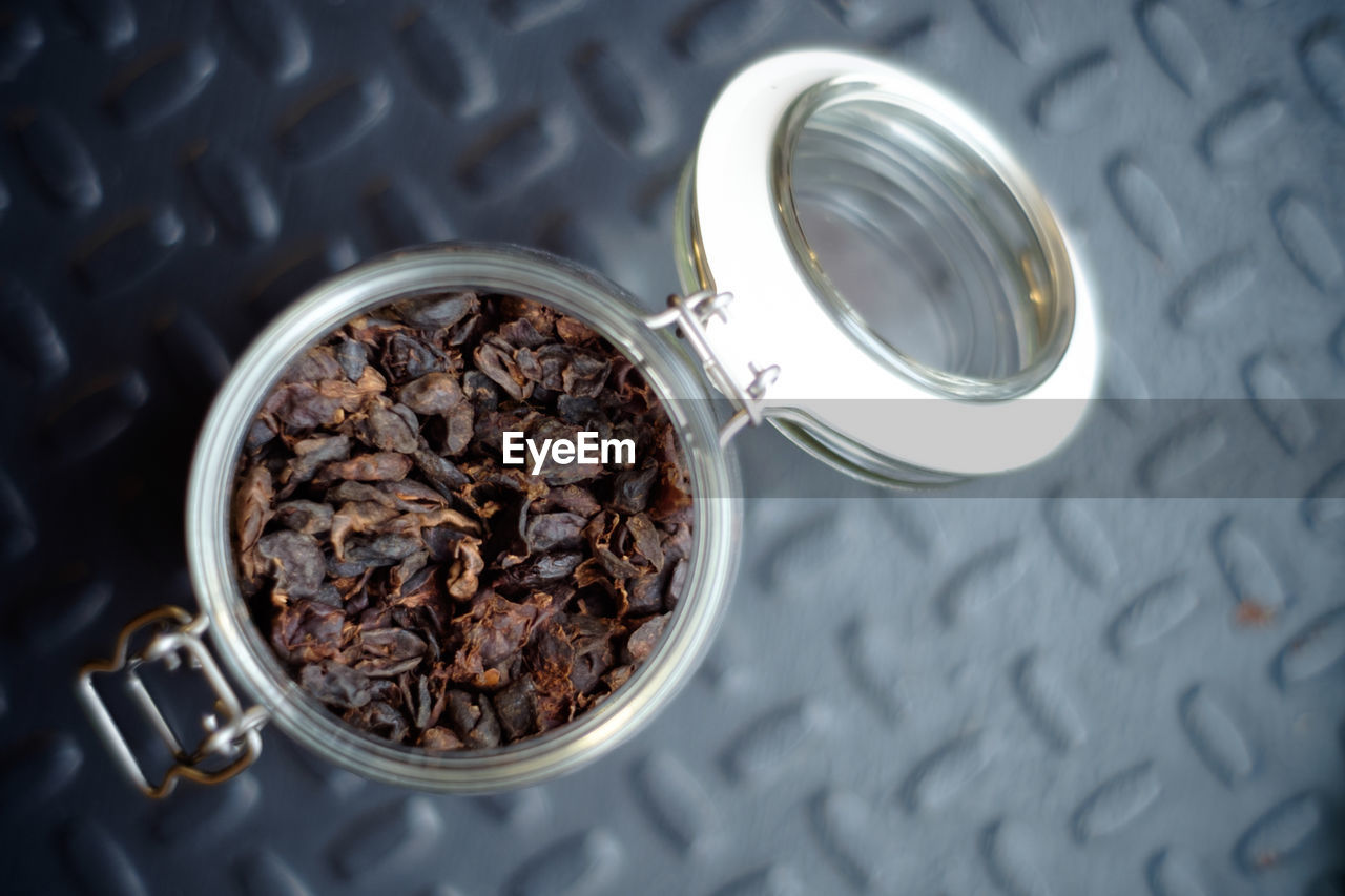 High angle view of coffee in jar on table