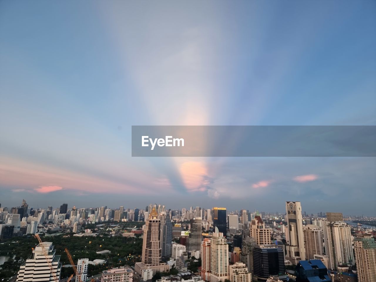 Cityscape against sky during sunset