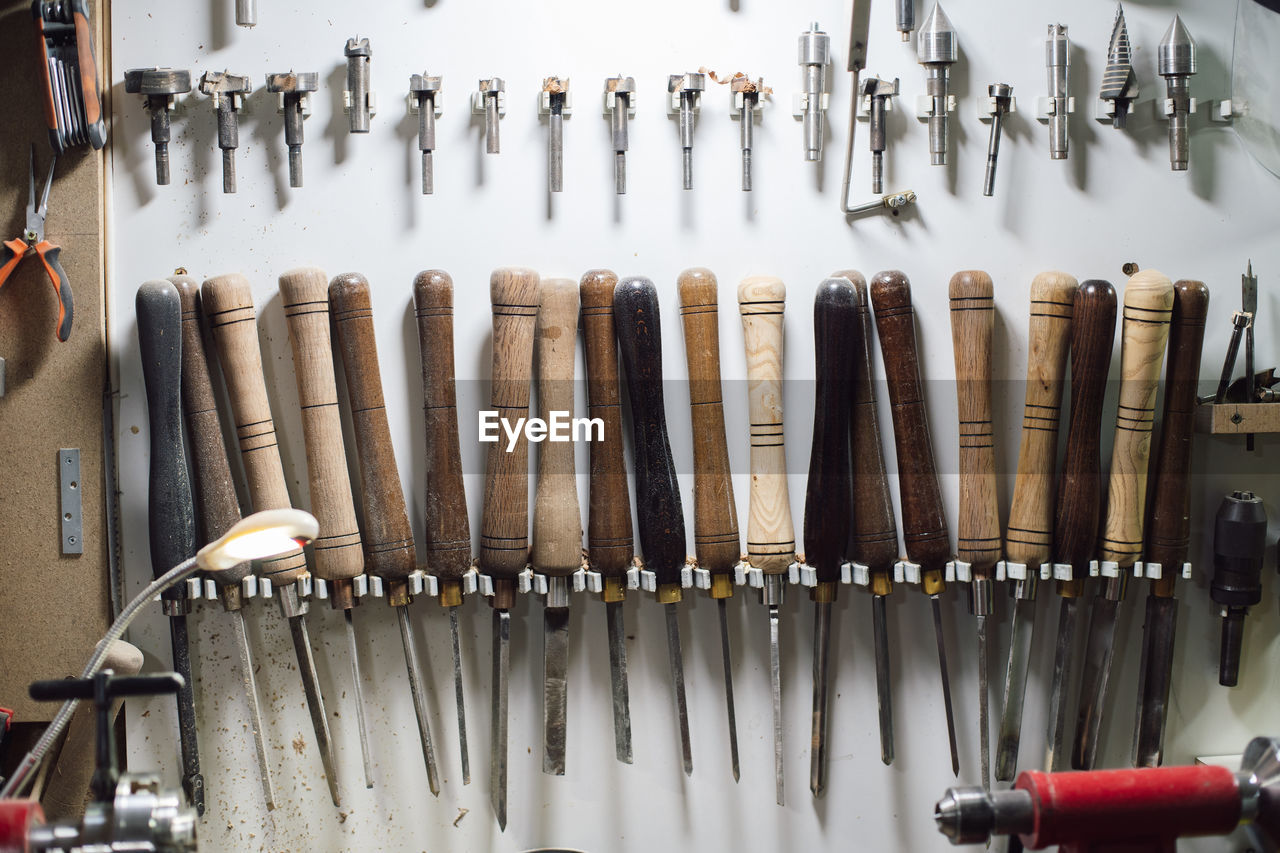 High angle view of tools in row