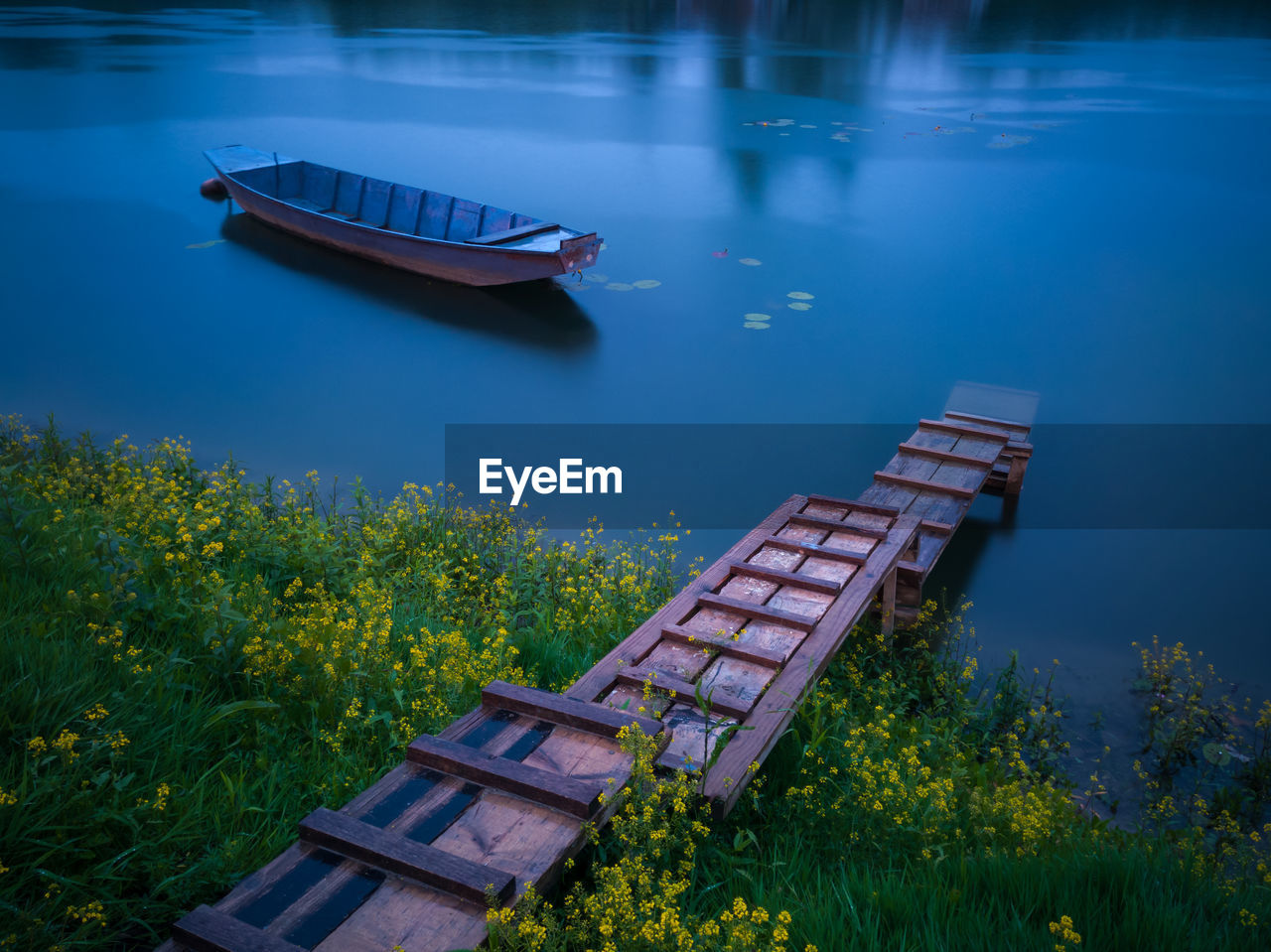 High angle view of boat moored on river