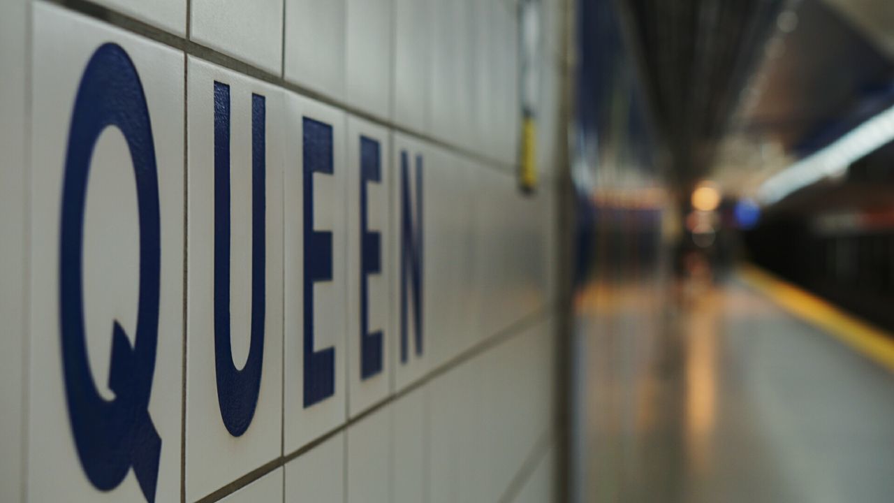 public transportation, architecture, indoors, communication, wall - building feature, selective focus, no people, text, transportation, reflection, built structure, safety, subway station, focus on foreground, close-up, illuminated, security, rail transportation, sign